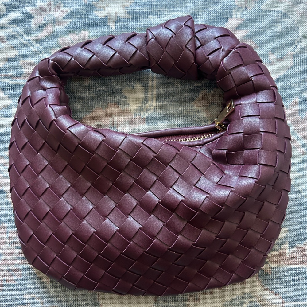 Urban Expressions leather woven purse. Plum color. Great condition.